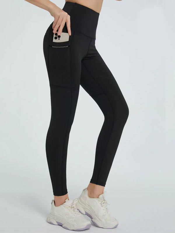 Black high-waisted active leggings with side phone pocket, shown from side