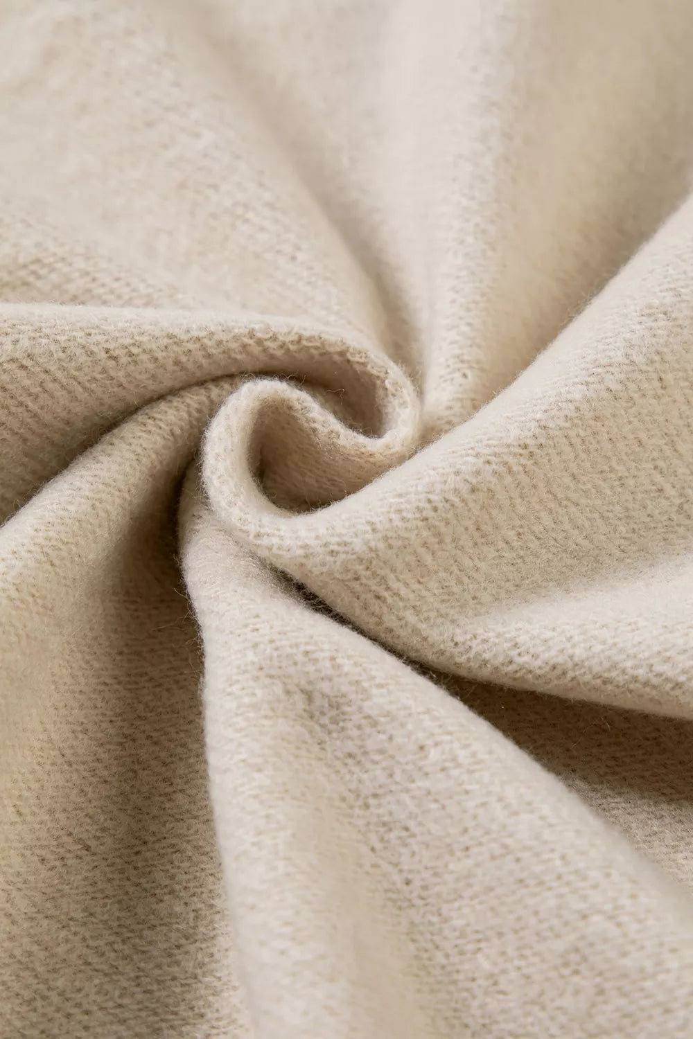 Close-up of soft beige sweatshirt fabric