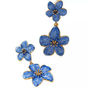 Blue double-flower drop earrings arranged at different angles on a white background.