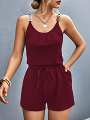 Burgundy scoop-neck romper with decorative shoulder rings