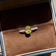 Copper oval zircon ring with polished yellow finish, back view