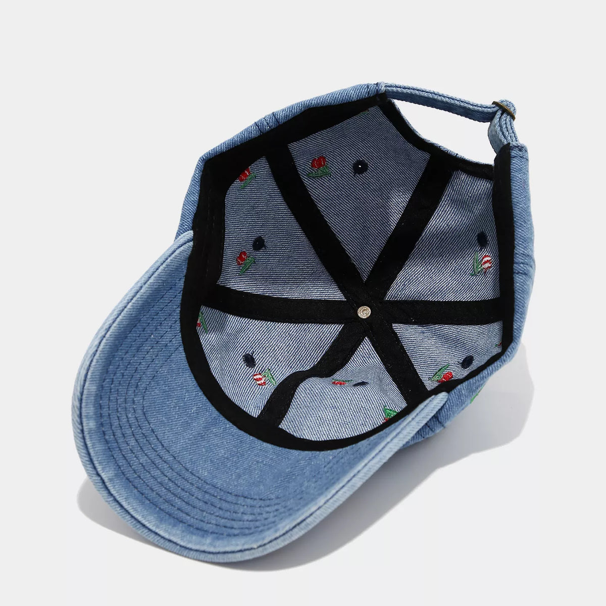 Inside view of cherry embroidered denim baseball cap