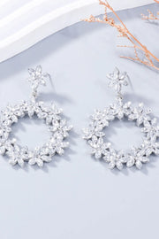 Pair of white flower-shaped rhinestone drop earrings
