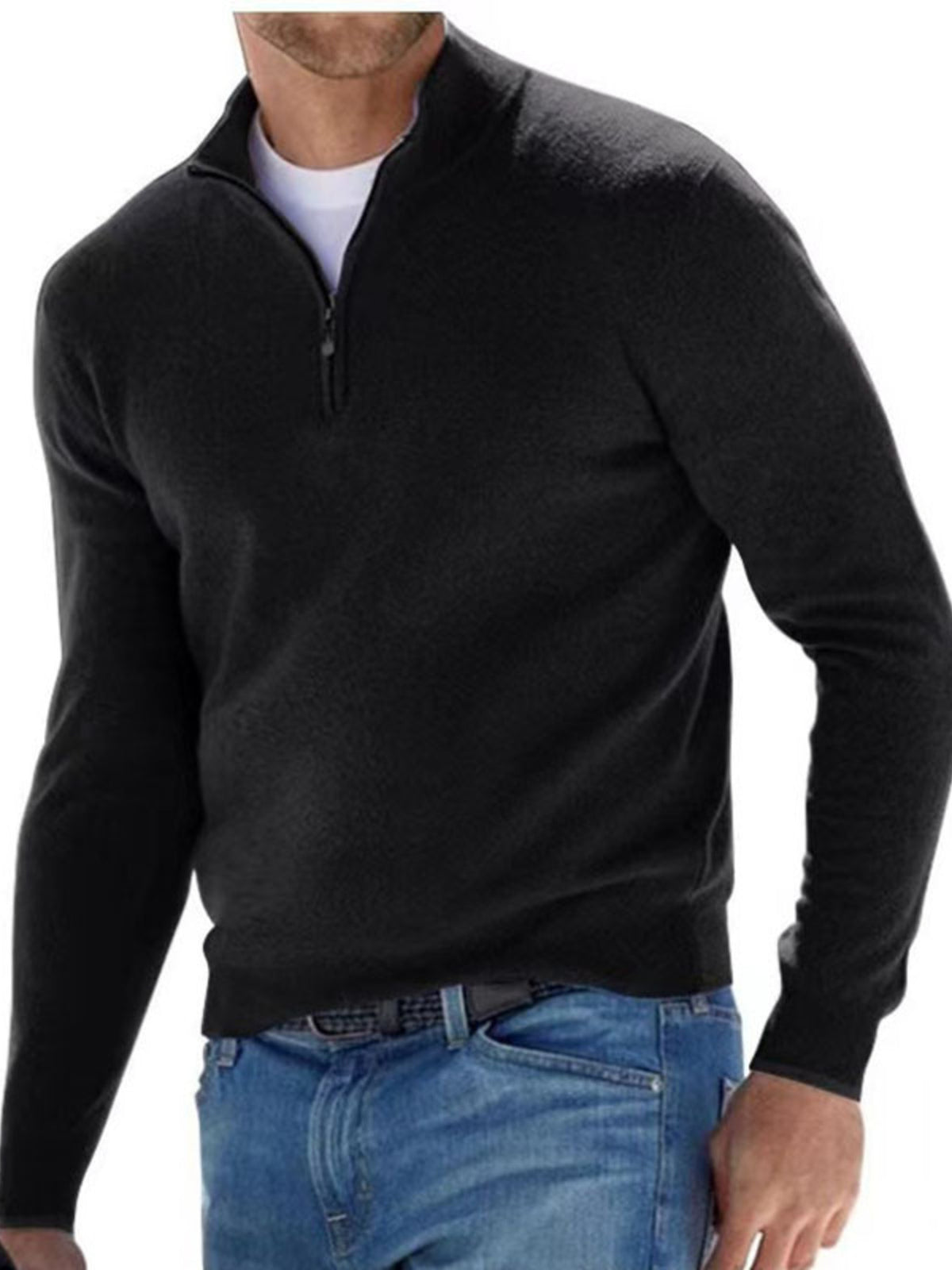 Black quarter-zip sweater modeled with blue jeans
