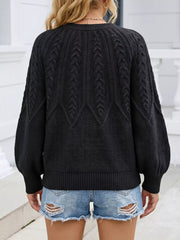 Back view of the black cable-knit sweater