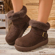 Tan ankle boots shown from behind