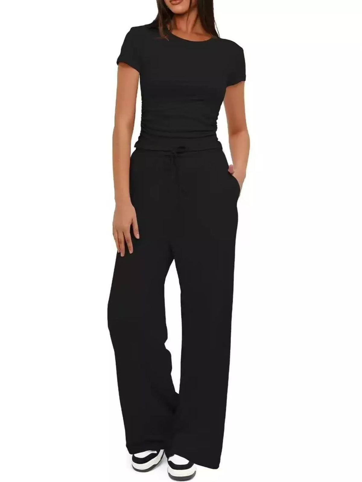 Back view of the black tank and matching pants.