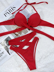 Red crisscross halter bikini set laid flat, front view