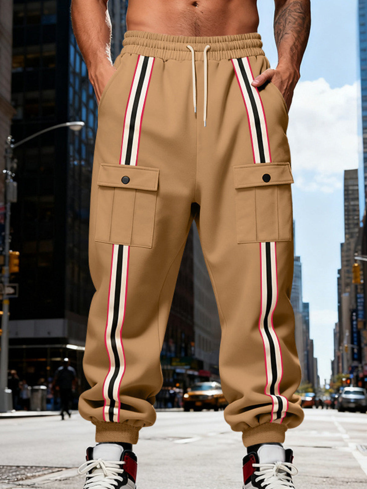 Model wearing tan striped cargo joggers