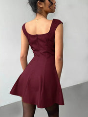 Back view of burgundy sleeveless A-line mini dress