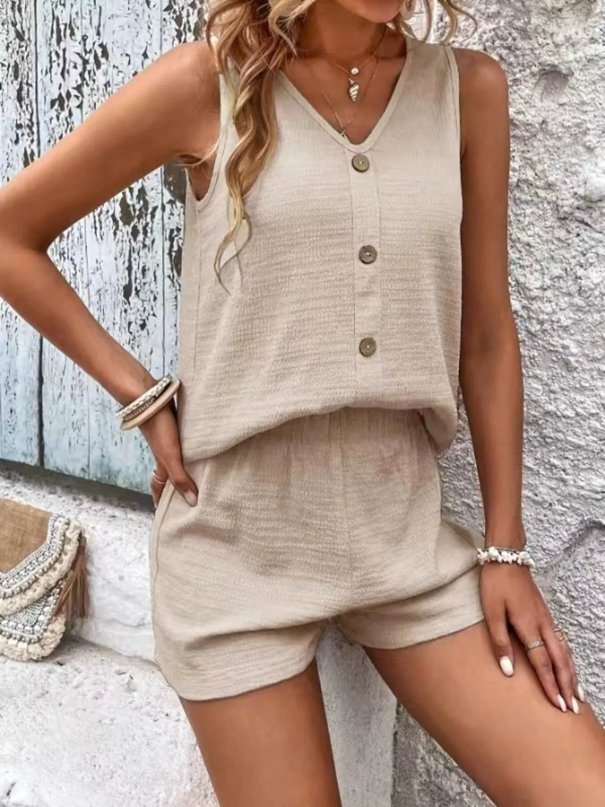 Front view of the beige button-front tank and matching shorts set.