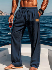 Man wearing navy wide-leg drawstring pants