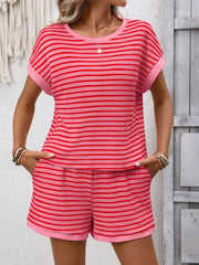 Back view of the coral-pink striped top and matching shorts.