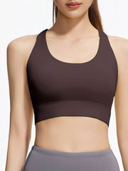 Front view of dark brown scoop-neck active bra with a wide underband