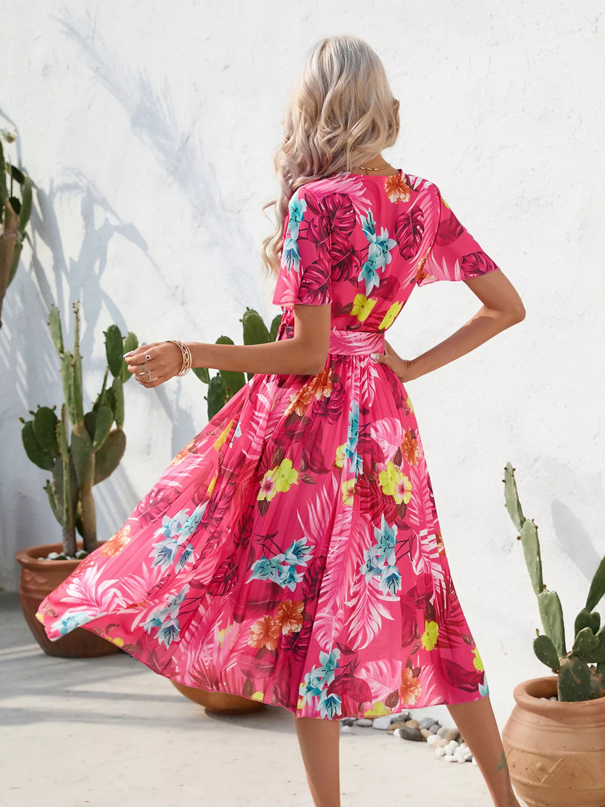 Hot pink tropical print dress, rear view