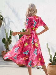 Hot pink tropical print dress, rear view