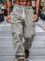 Front view of gray corduroy pants with oversized cargo pockets