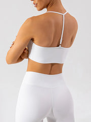 Back view of white active bra with adjustable center strap