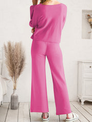 Bright pink drawstring lounge pants shown with matching top from the waist down