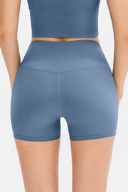 Rear view of slate-blue ribbed biker shorts with wide waistband
