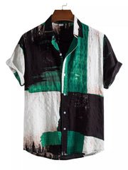 Green, black and white color-block short-sleeve button-up shirt shown from the front