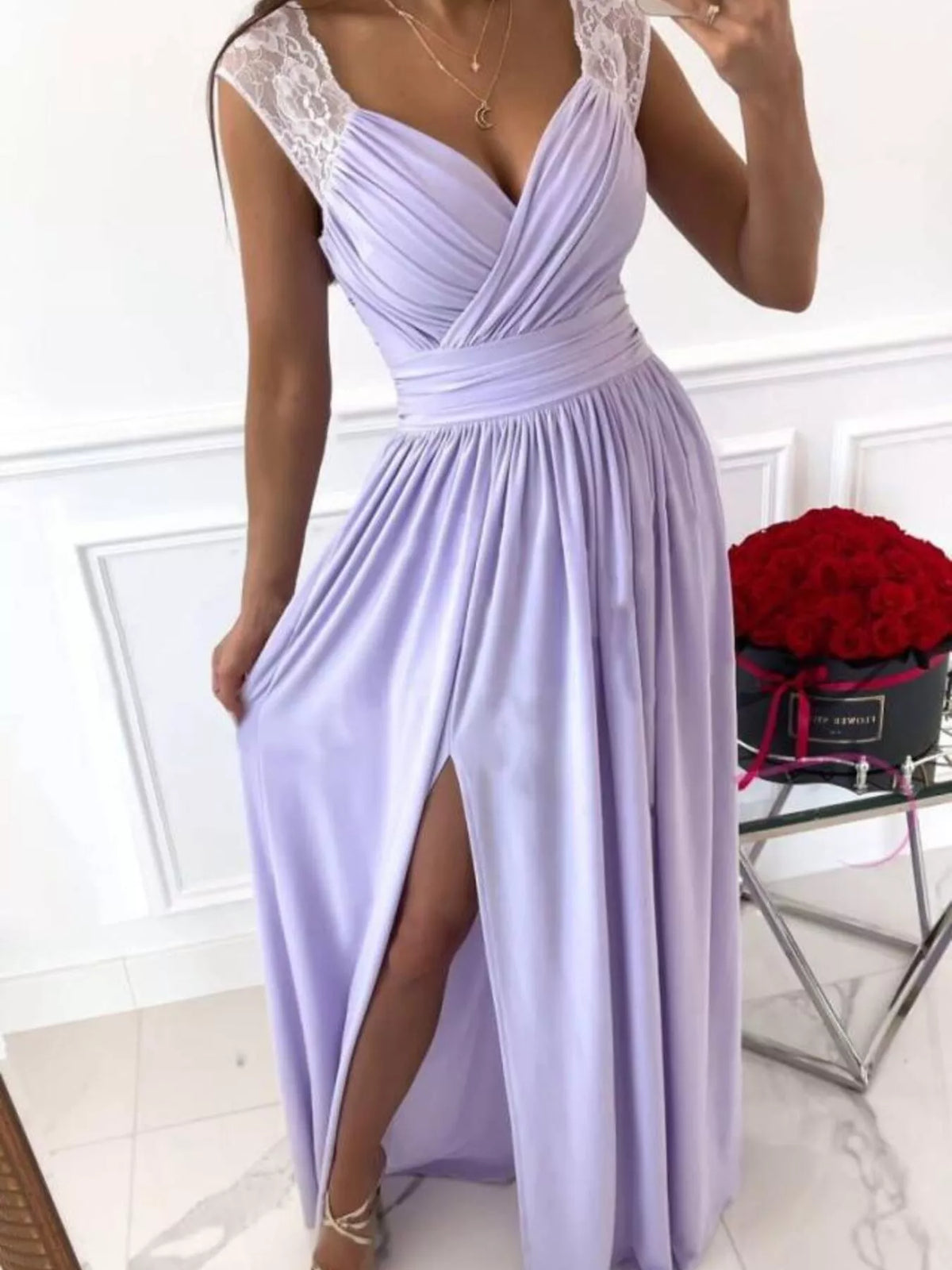 Front view of lavender maxi dress showing lace straps and slit skirt