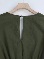 Close-up of olive back closure