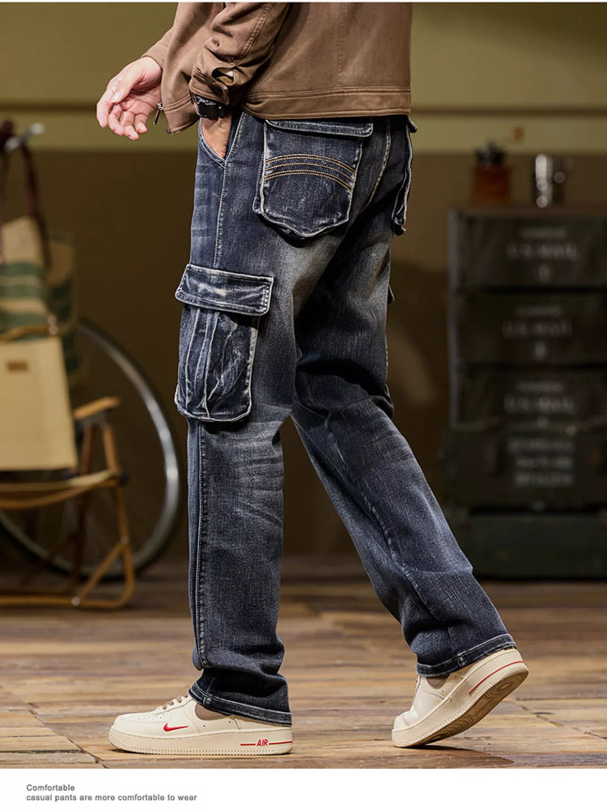 Dark cargo jeans shown from the side and back