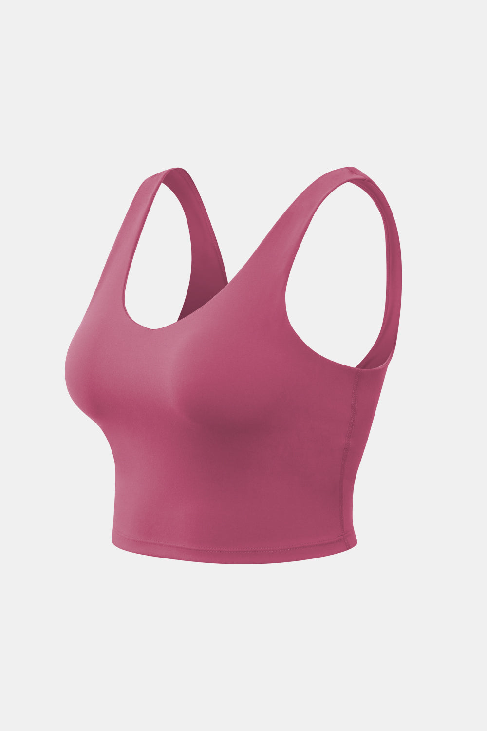 Rose pink cropped scoop-neck active tank shown at a three-quarter angle