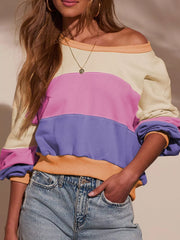 Front view of color-block top with gathered sleeves
