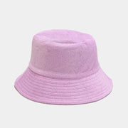 Pink and green wide-brim bucket hats shown from the front