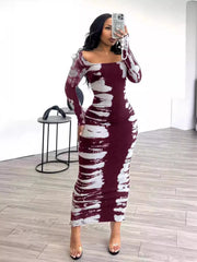 Wine red and white fitted tie-dye maxi dress shown in a mirror