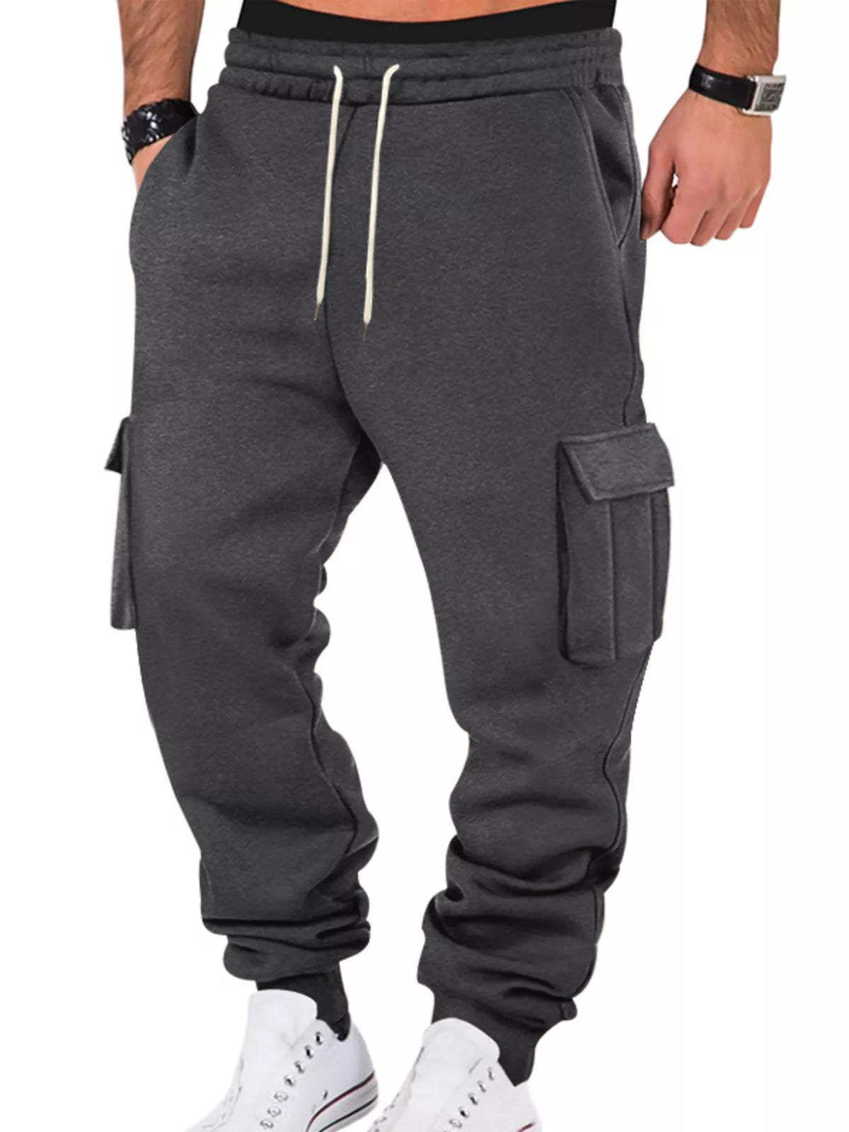Model wearing charcoal cargo joggers, front view