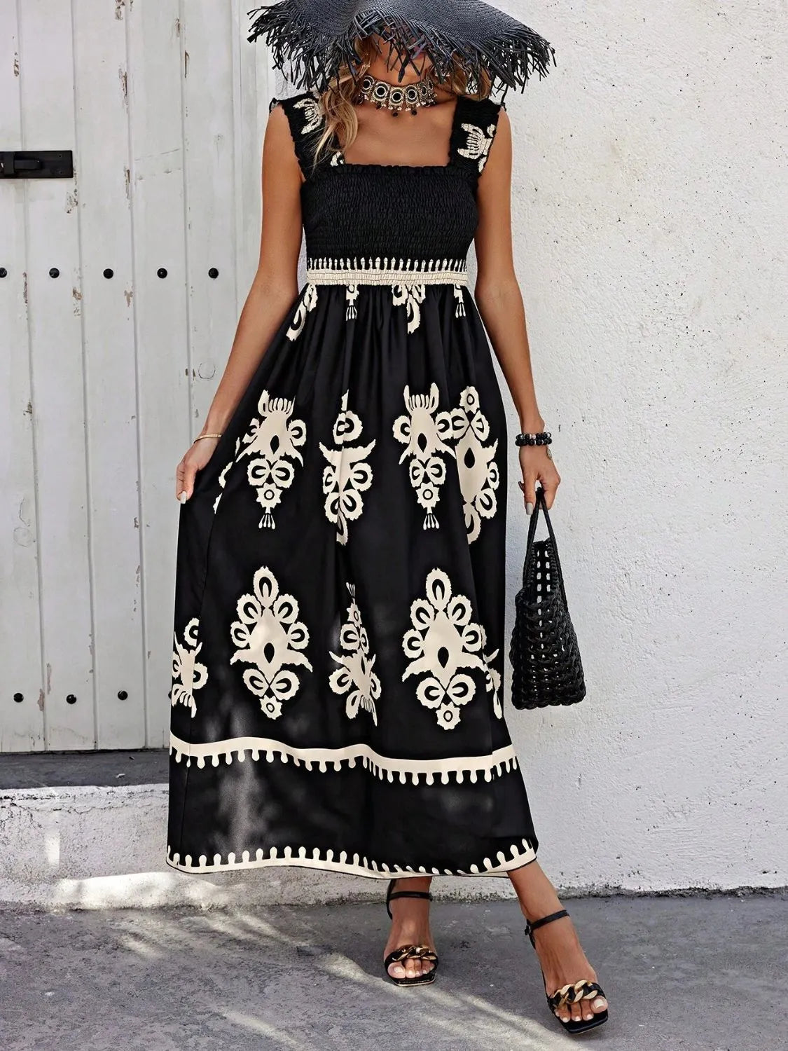 Black and cream printed smocked maxi dress, front view