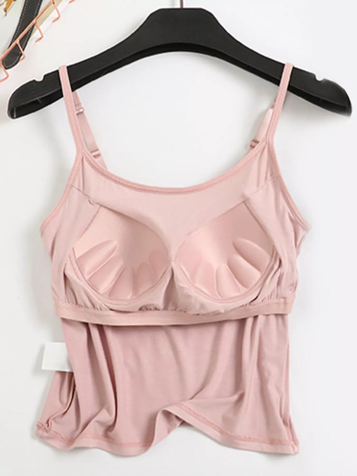 Pink padded cami close-up showing bust seams