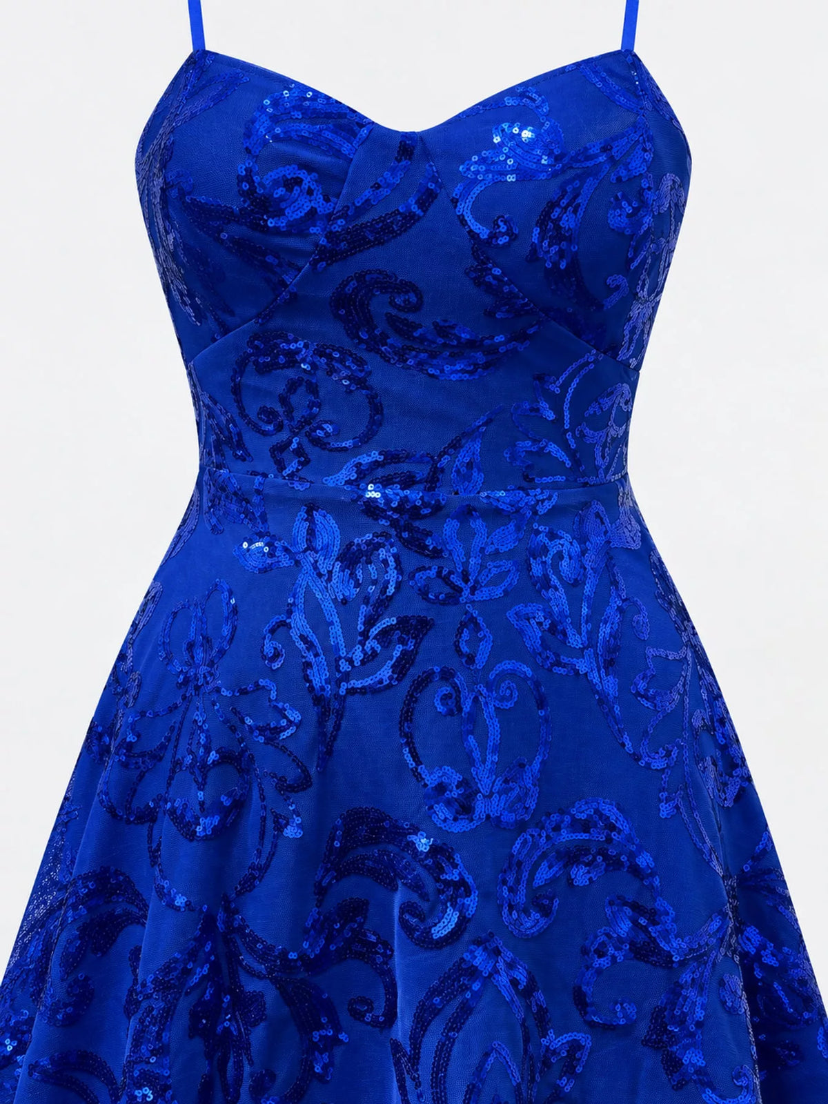 Close-up of the royal blue dress's shaped bodice, waist seam and floral-sequin pattern.
