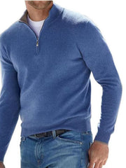 Blue quarter-zip sweater modeled with blue jeans