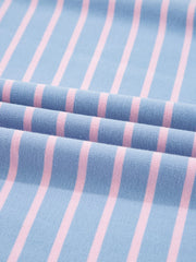 Close-up of blue fabric with narrow pink stripes