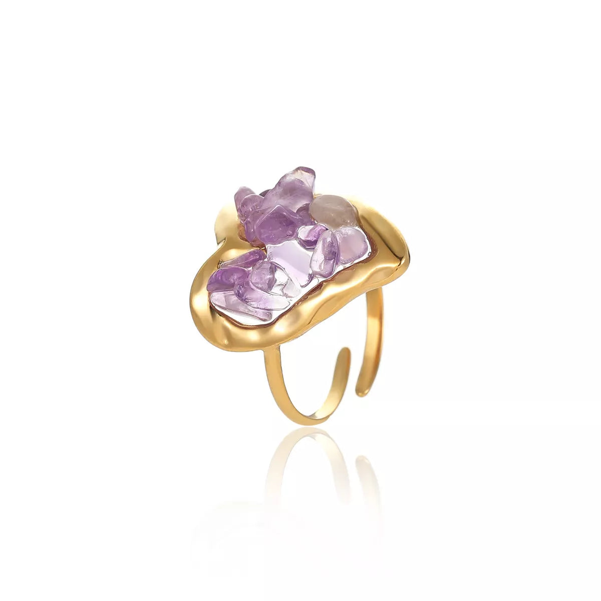Gold-plated heart ring with pink stones shown upright on a white background