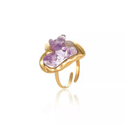 Gold-plated heart ring with pink stones shown upright on a white background