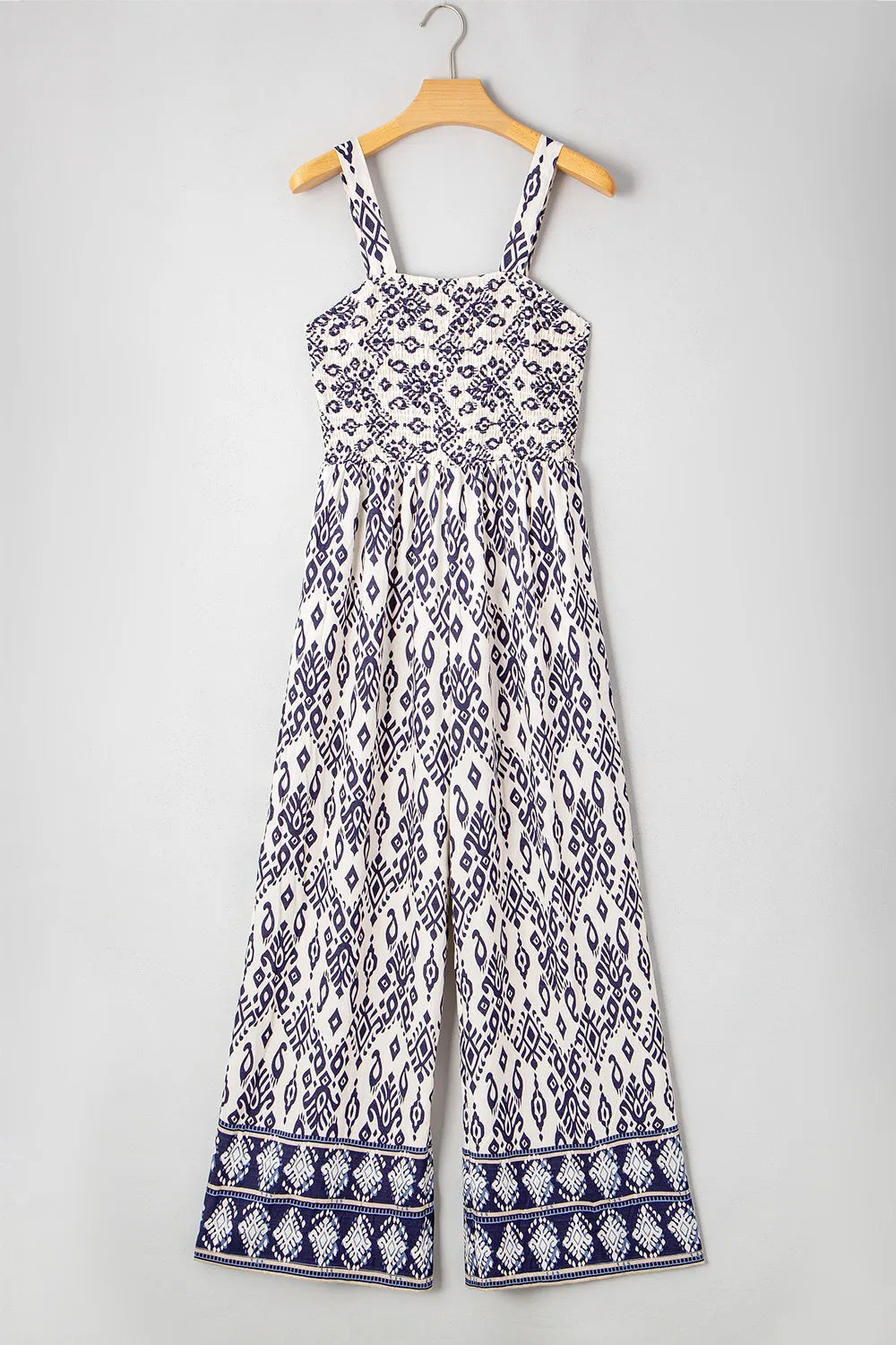 Full-length printed jumpsuit on hanger