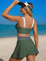 Sage green swim skort set shown from the back