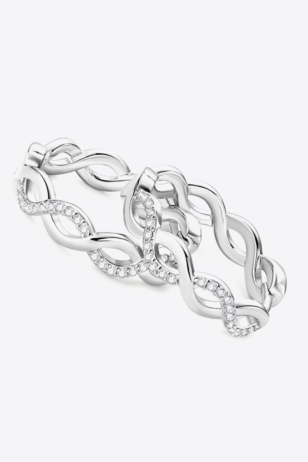 Pair of silver-tone crisscross hoops angled to show the intertwined design
