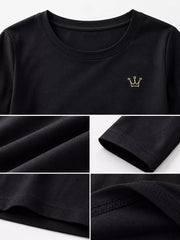 Close-up of crown embroidery and seams on black T-shirt