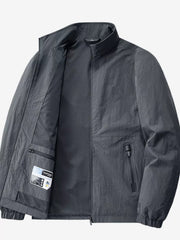 Open charcoal jacket showing the inner pocket and label inside the front panel