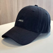 Black cotton baseball cap with small Hello embroidery on front