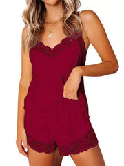 Burgundy camisole and matching shorts with dark floral lace neckline and hems, front view