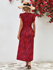Back view of red printed surplice dress with flutter sleeves.