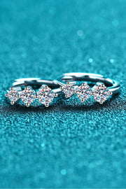 Side view of stone-set huggie hoop earrings