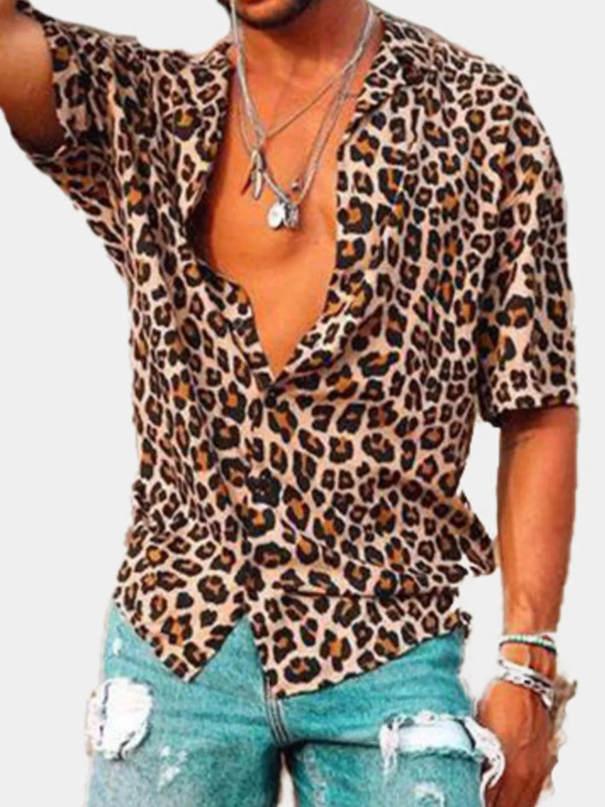 Model wearing a leopard-print short-sleeve button-up shirt